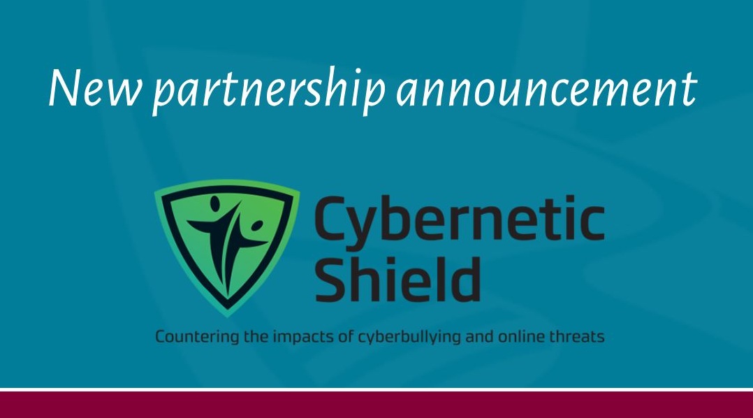 Graphic announcing a new partnership with Cybernetic Shield focused on countering cyberbullying and online threats.